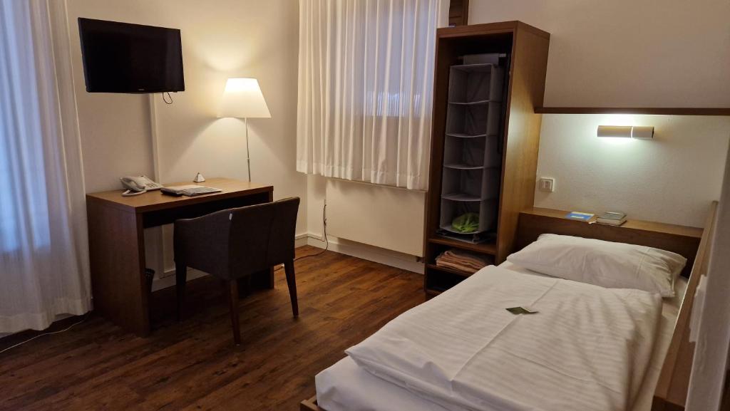 Postel nebo postele na pokoji v ubytování Kloster Drübeck