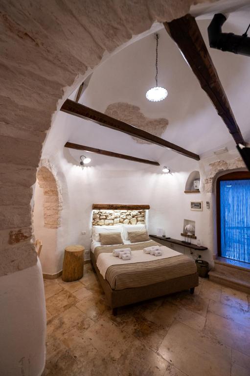 Letto o letti in una camera di Trullo Nobilis