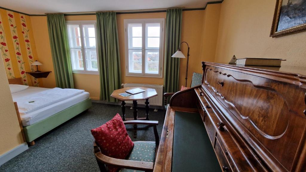 Postel nebo postele na pokoji v ubytování Kloster Drübeck