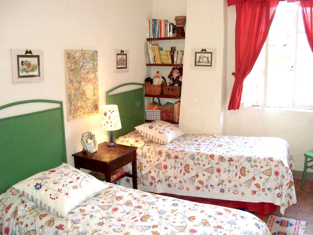 Postel nebo postele na pokoji v ubytování La Nella