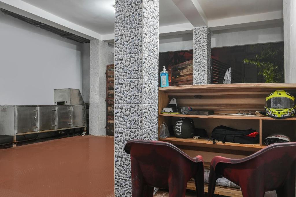 Kuchyň nebo kuchyňský kout v ubytování Hotel O ARES RESIDENCY