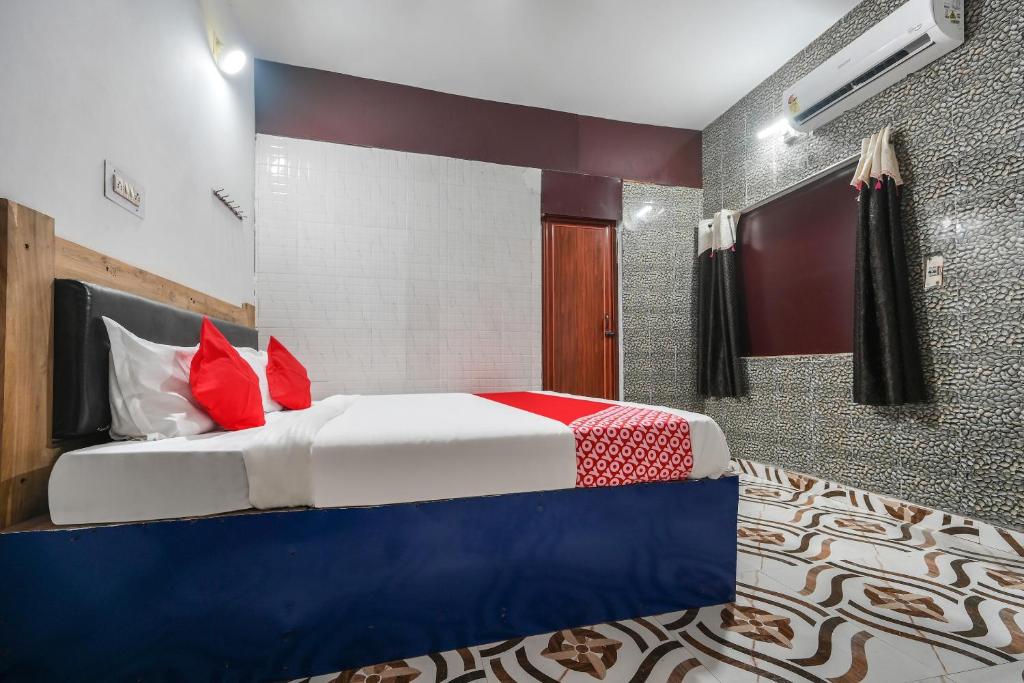 Postel nebo postele na pokoji v ubytování Hotel O ARES RESIDENCY