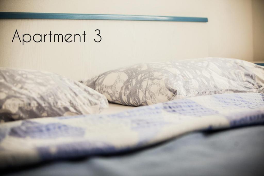 Posteľ alebo postele v izbe v ubytovaní Apartment in Lopar with balcony, air conditioning, W-LAN, washing machine (186-3)