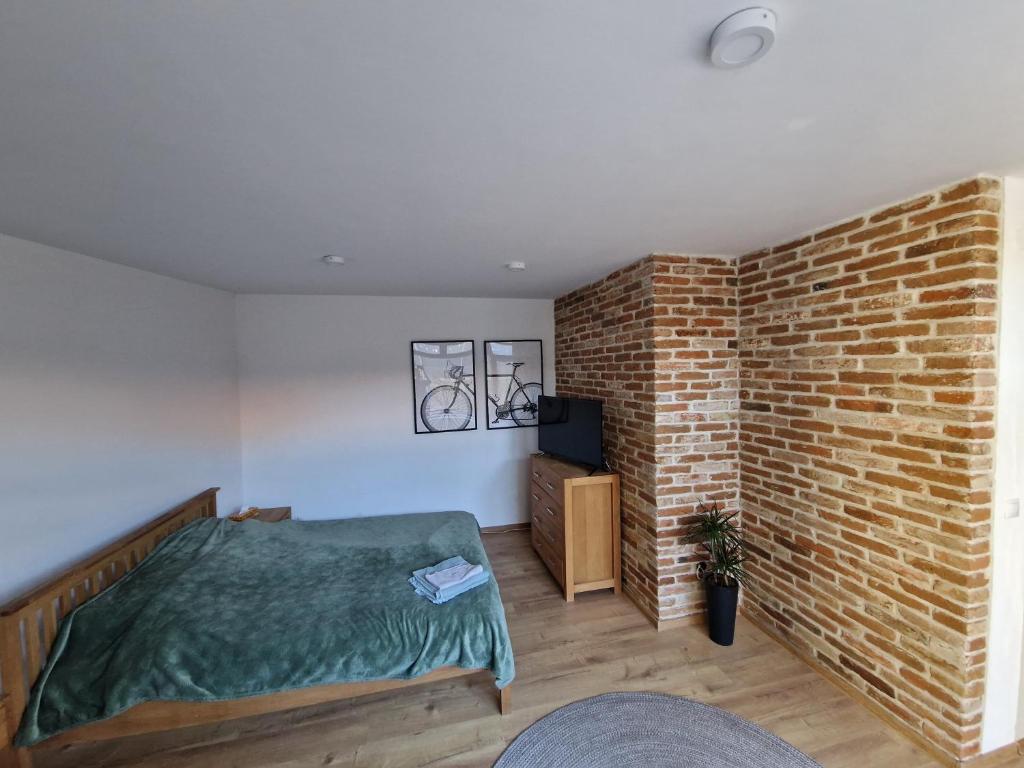 Postel nebo postele na pokoji v ubytování GIRO Guest House