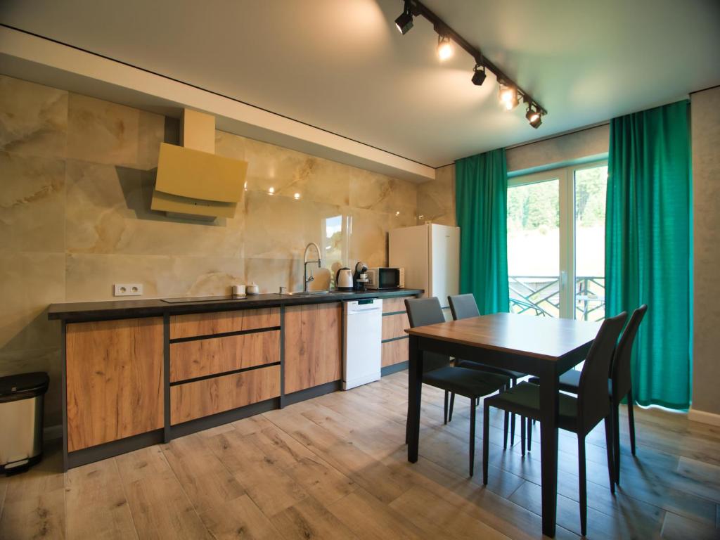 Kuchyň nebo kuchyňský kout v ubytování Nicole hotel