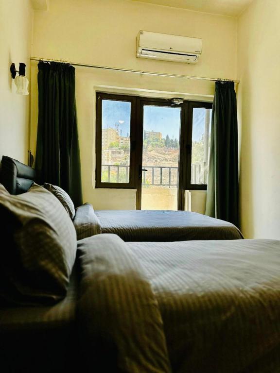 Postel nebo postele na pokoji v ubytování Zaman Ya Zaman Boutique Hotel