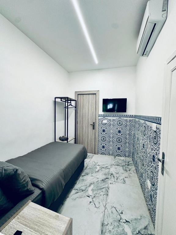 Postel nebo postele na pokoji v ubytování Zaman Ya Zaman Boutique Hotel