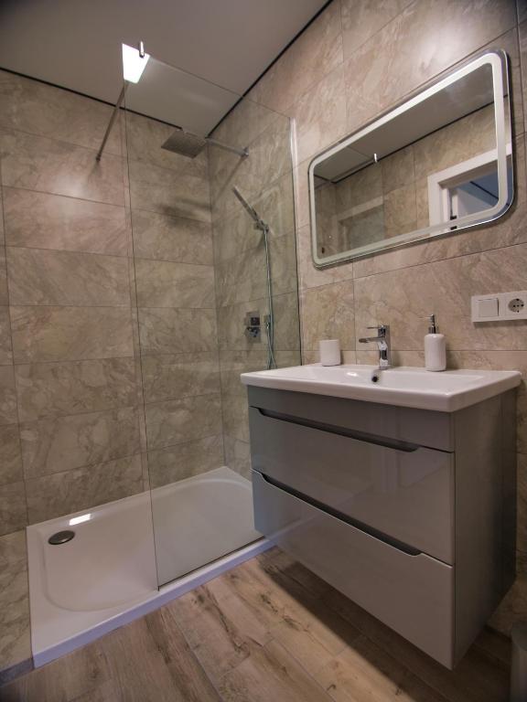 Koupelna v ubytování Nicole hotel