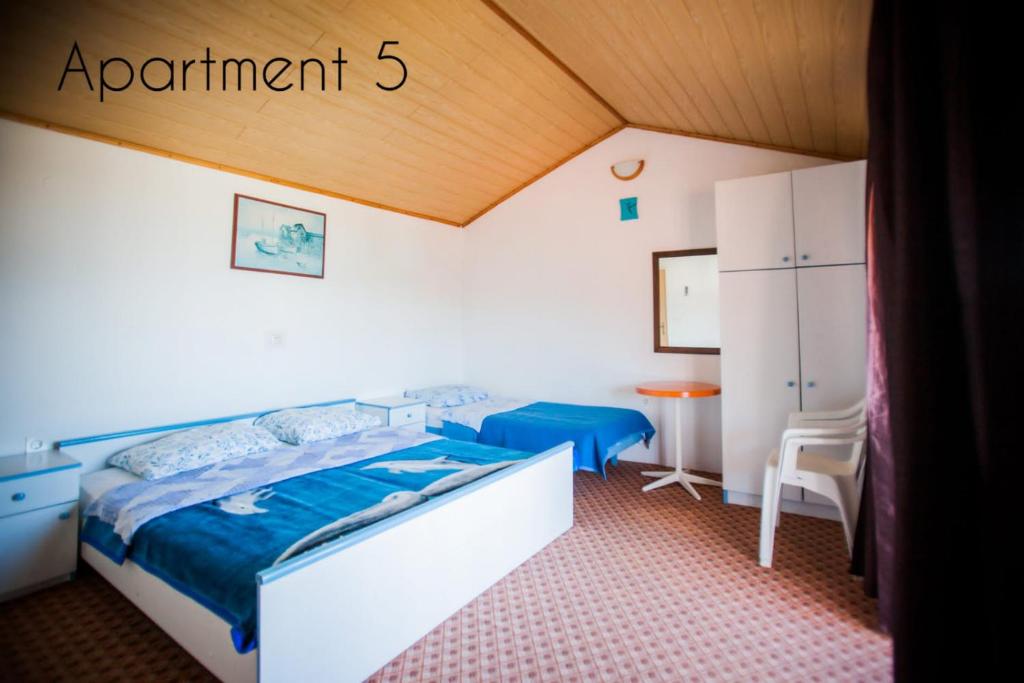 Postel nebo postele na pokoji v ubytování Holiday Home (186-5)
