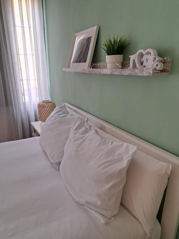 A bed or beds in a room at Apartamento Sabugo