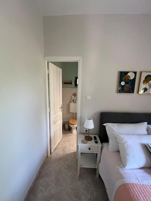 Postel nebo postele na pokoji v ubytování Alexias Home