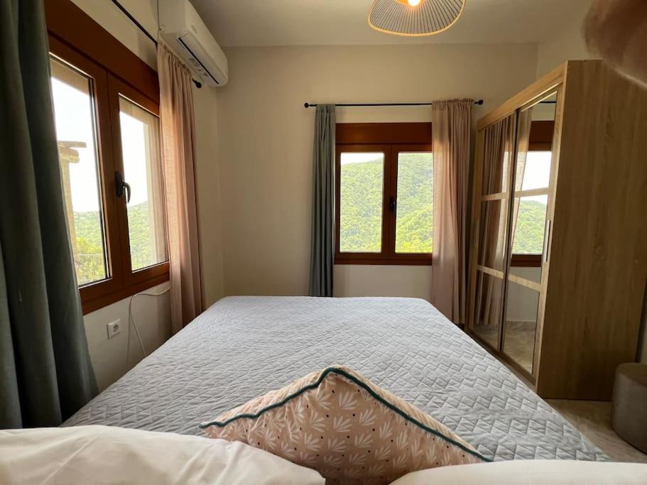 Postel nebo postele na pokoji v ubytování Alexias Home