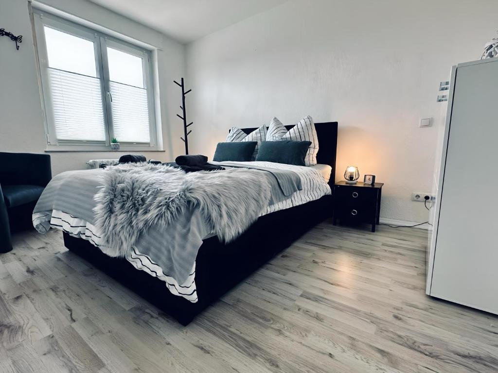 Postel nebo postele na pokoji v ubytování FeWo Euregio Terrasse & Klinik-Nähe