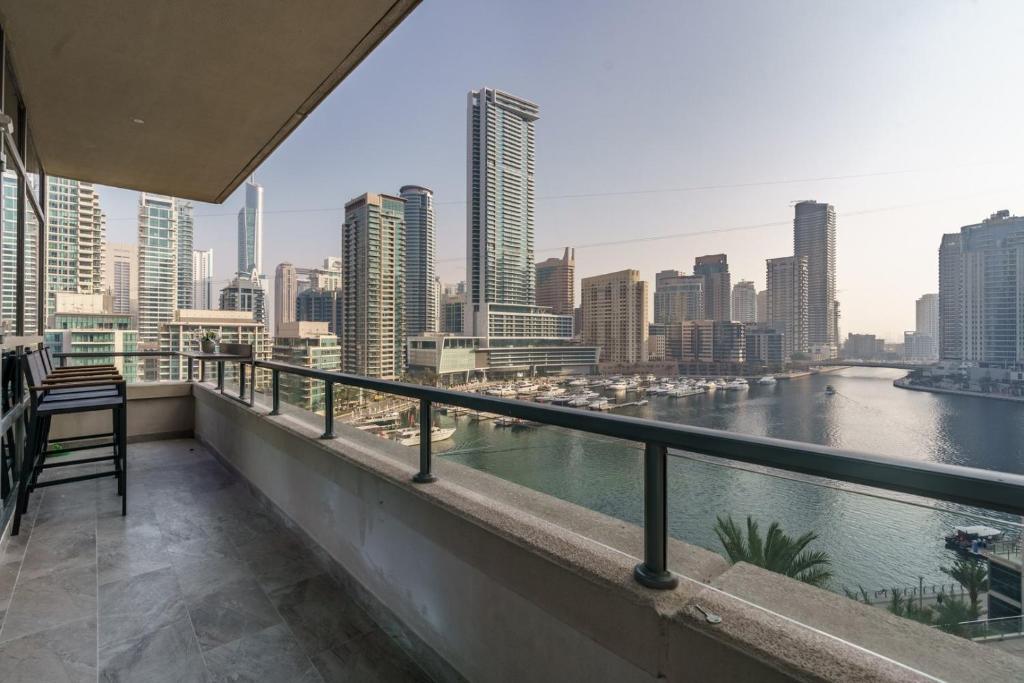 a balcony with a view of the city at GuestReady - Bohemian Apt with Marina View in Dubai