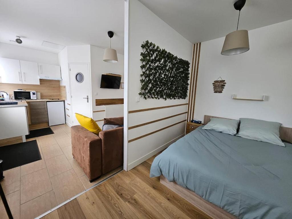 Η κουζίνα ή μικρή κουζίνα στο studio Vercingétorix - Proche Paris & Disney