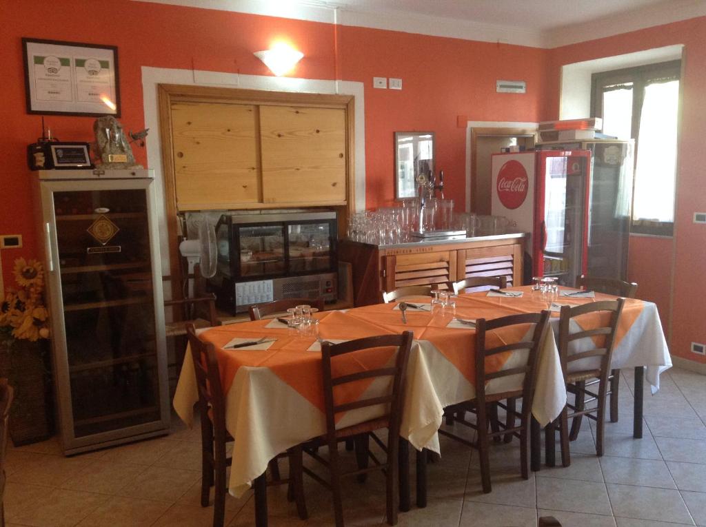 Kuchyň nebo kuchyňský kout v ubytování Hotel La Rosa