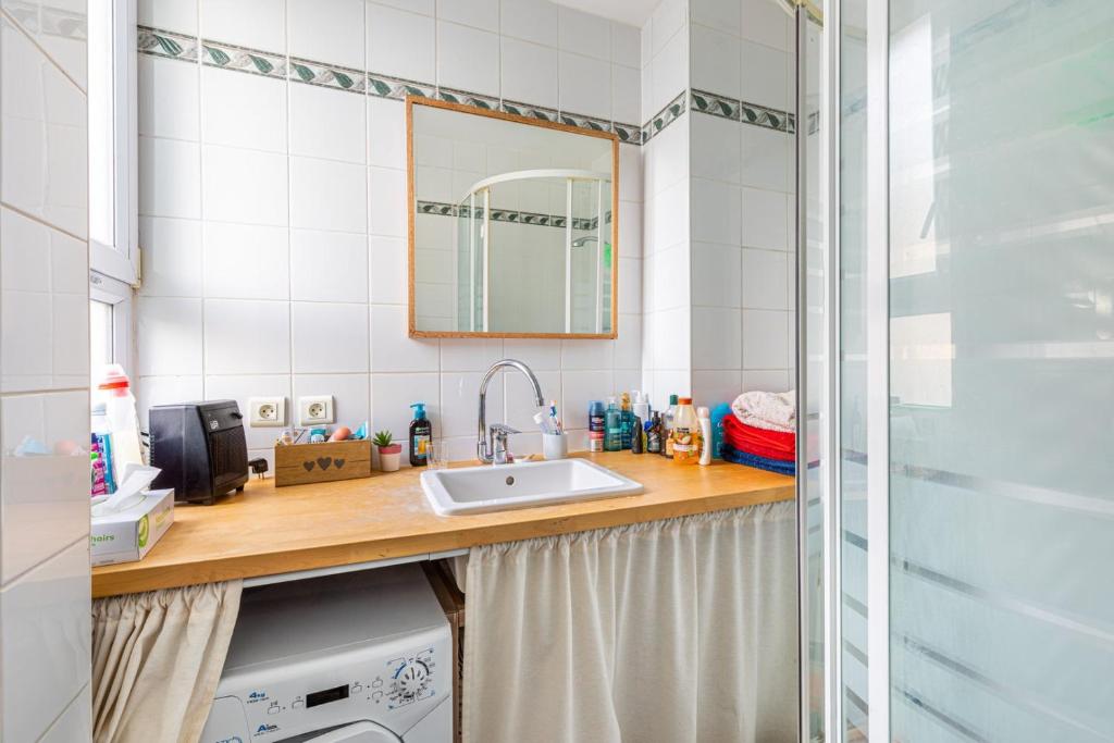 Kuchnia lub aneks kuchenny w obiekcie GuestReady - Amazing stay in the 19th arr.
