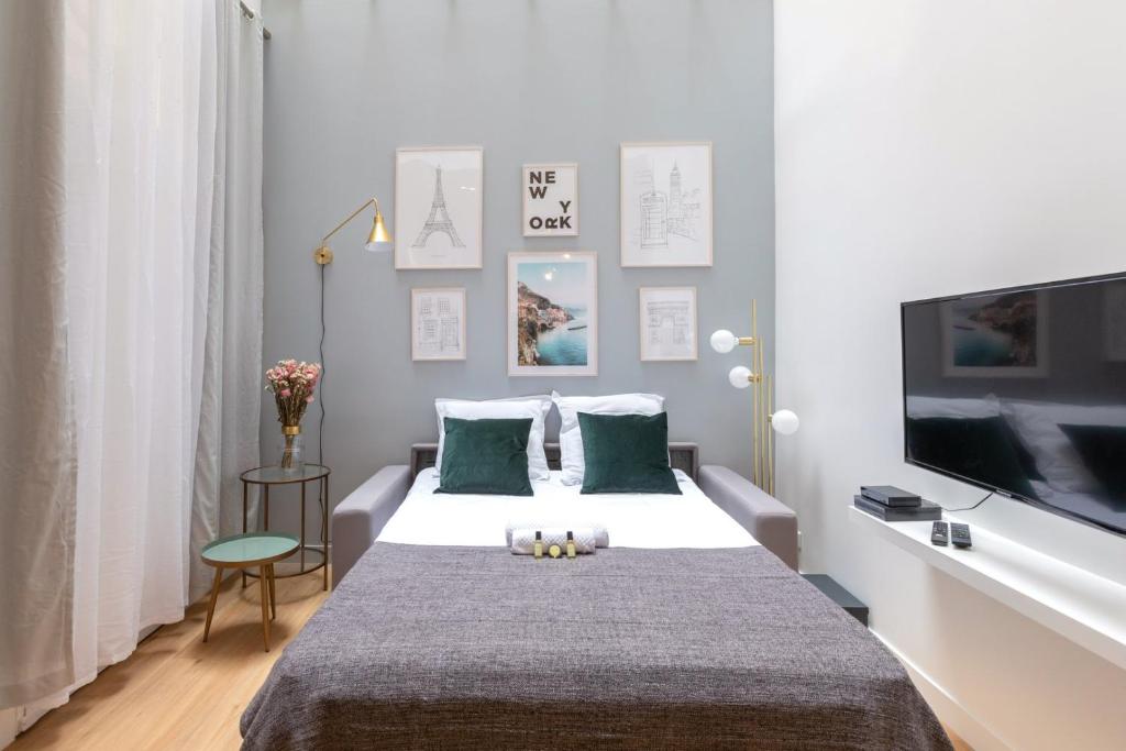 Posteľ alebo postele v izbe v ubytovaní Cosy Apartment near the Invalides