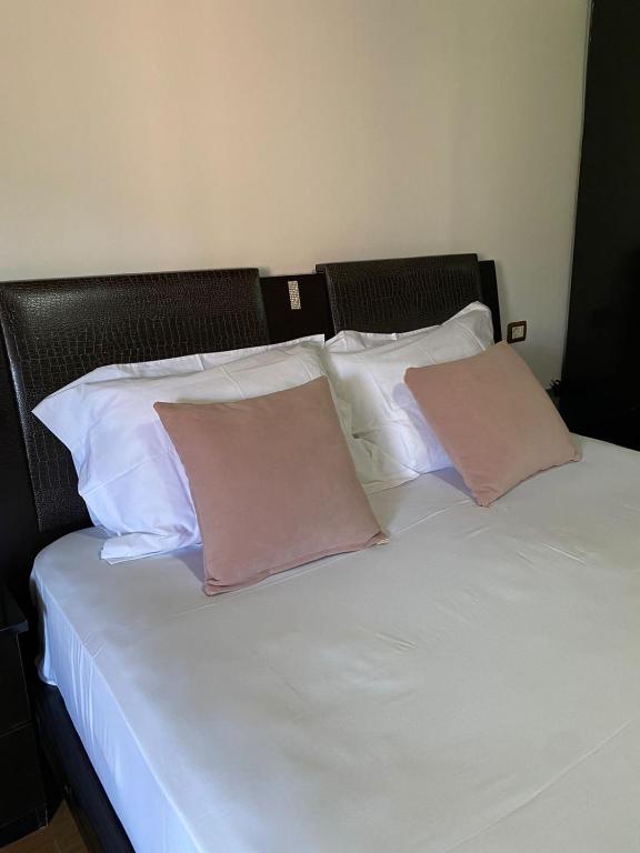 Postel nebo postele na pokoji v ubytování Bertis guest house