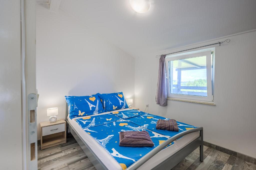 Postel nebo postele na pokoji v ubytování Marlera apartments with Sea View
