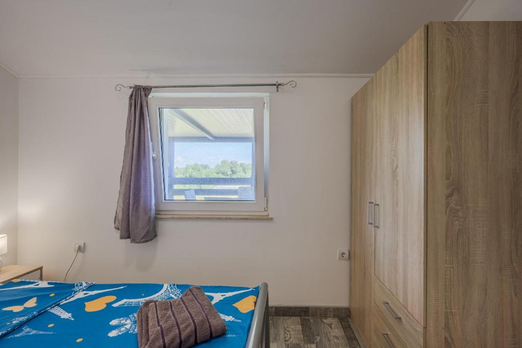 Postel nebo postele na pokoji v ubytování Marlera apartments with Sea View
