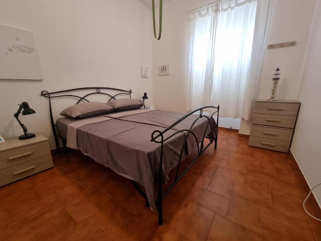Posteľ alebo postele v izbe v ubytovaní Villa Lido with pool and garden