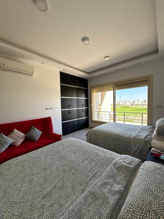 Postel nebo postele na pokoji v ubytování Hacienda Bay, North Coast