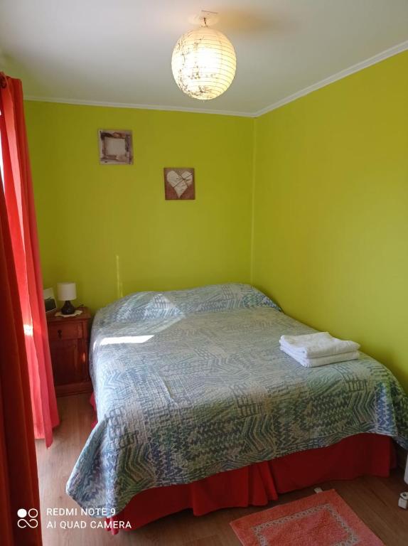 Postel nebo postele na pokoji v ubytování Cabaña a pasos del mar en Algarrobo