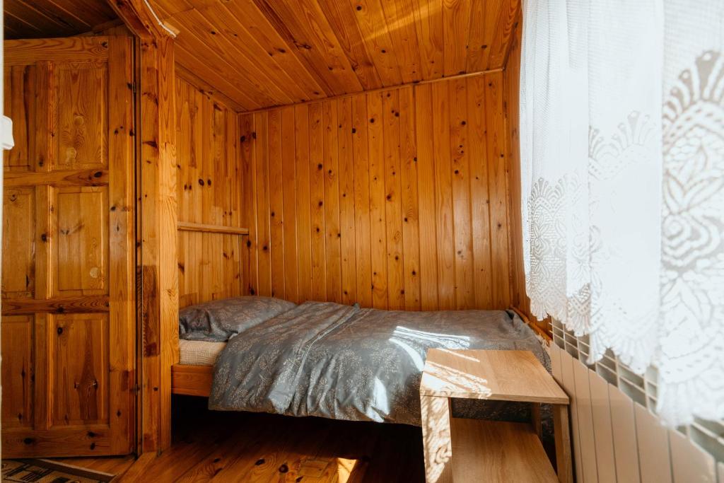 Postel nebo postele na pokoji v ubytování Domki u Serowarki