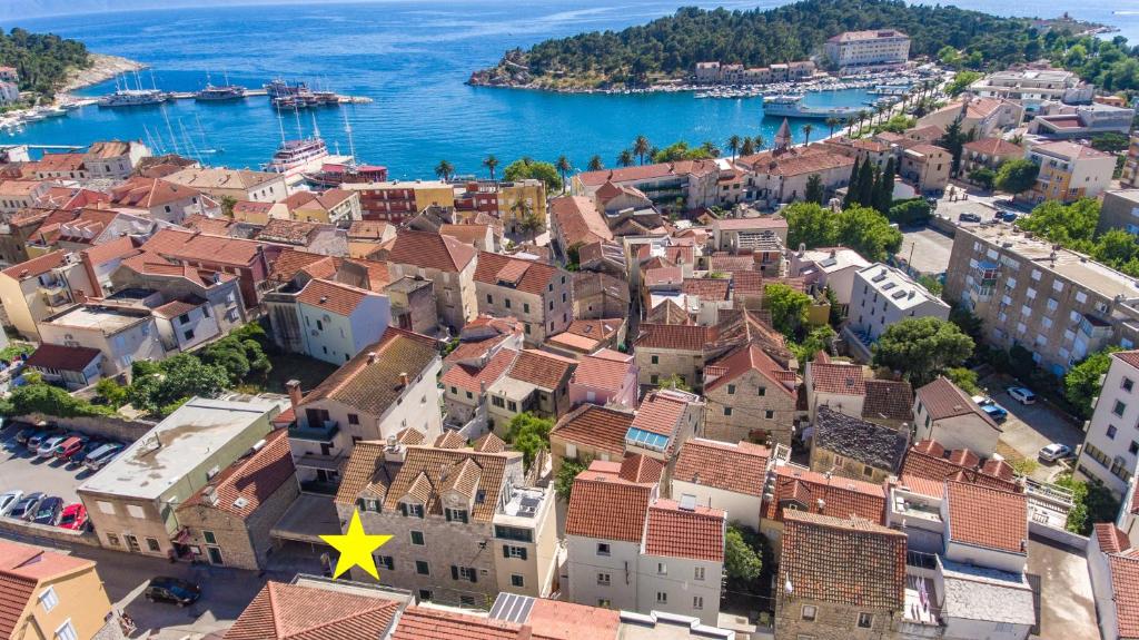 an aerial view of a town next to the water at NEW - Casa Columba - 4 Star Design Boutique Hotel with Outdoor Pool & Private Garden in Makarska