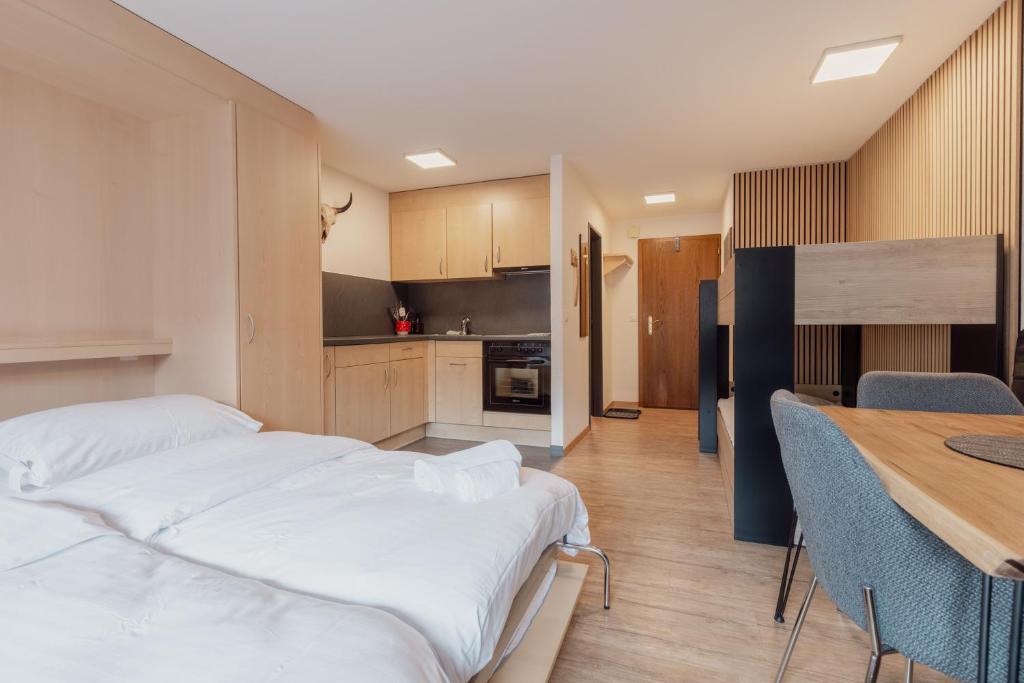 Kuchyň nebo kuchyňský kout v ubytování Charmant studio au centre de Saas-Fee