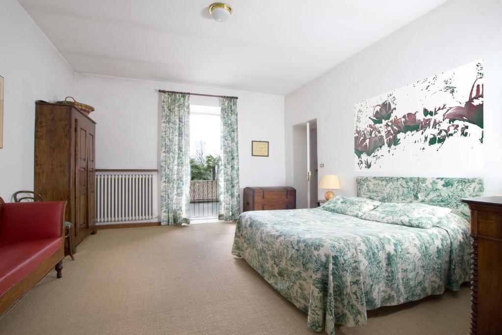 Łóżko lub łóżka w pokoju w obiekcie Agriturismo Il Torrione