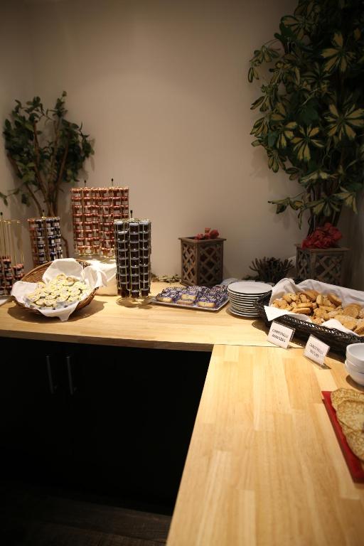 a table with plates of food on top of it at Hôtel Campo Dell'oro in Ajaccio