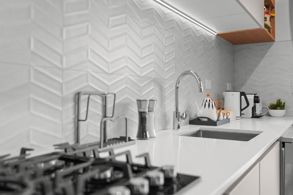 Kuchyň nebo kuchyňský kout v ubytování Sunshine Suites