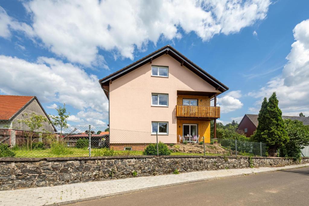 a house on the side of a road at Grashüpfer Plus bis 6 Pers in Freiensteinau