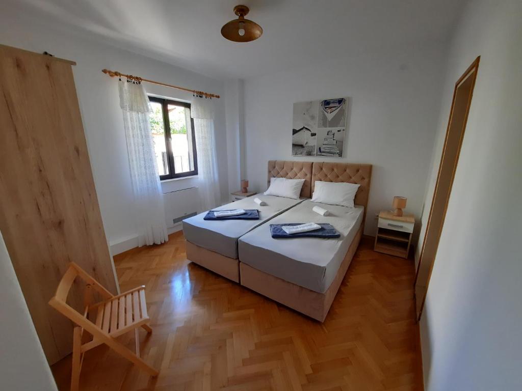 Postel nebo postele na pokoji v ubytování Pansion Drvo