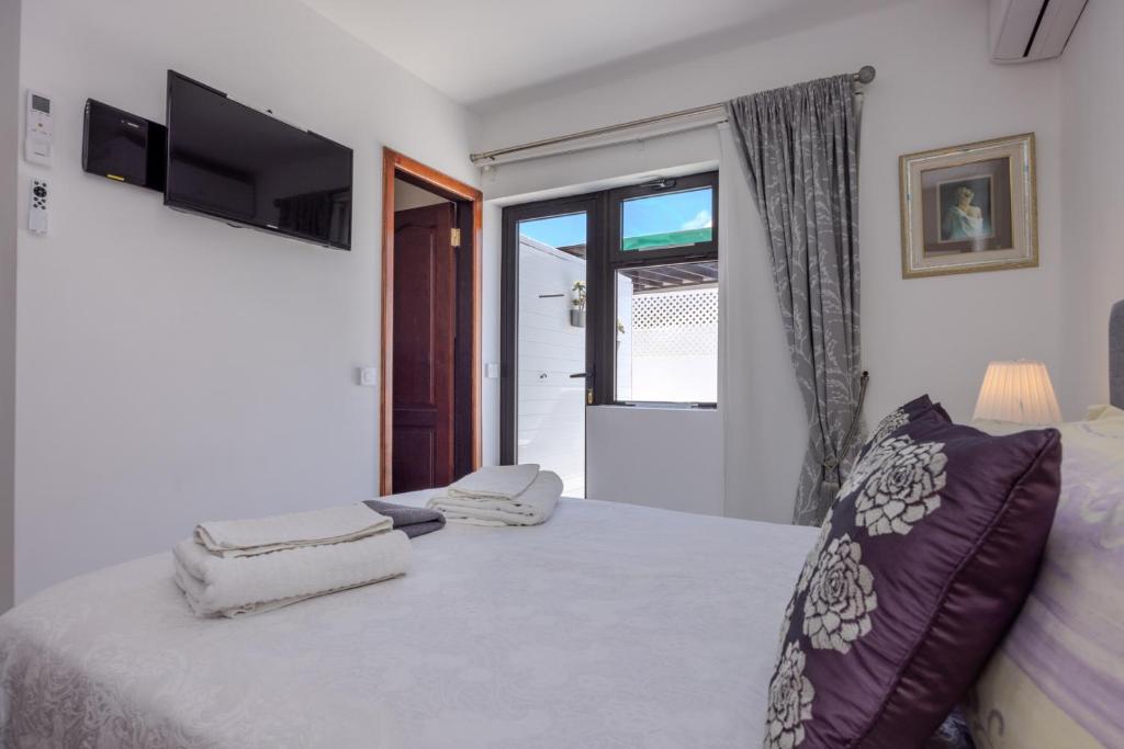 Postel nebo postele na pokoji v ubytování Villa Victoria