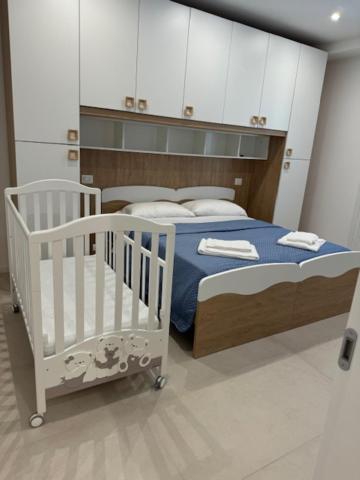 Postel nebo postele na pokoji v ubytování B&B La Coccinella