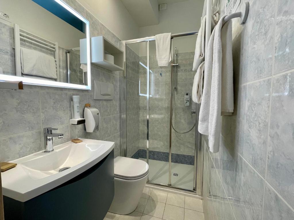 Koupelna v ubytování B City Hotel