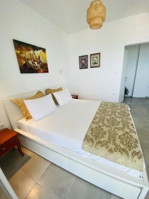 Postel nebo postele na pokoji v ubytování Sea view apartment2