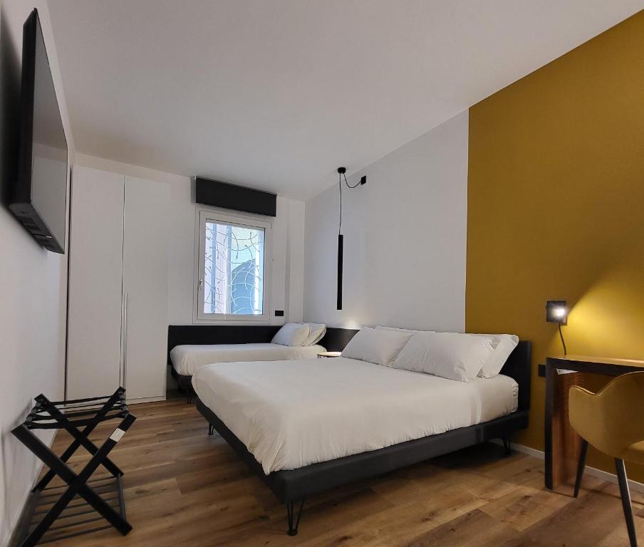 Postel nebo postele na pokoji v ubytování AdisArtur Elegant B&B