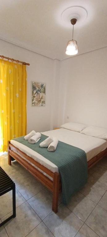 Postel nebo postele na pokoji v ubytování Catalina Studios