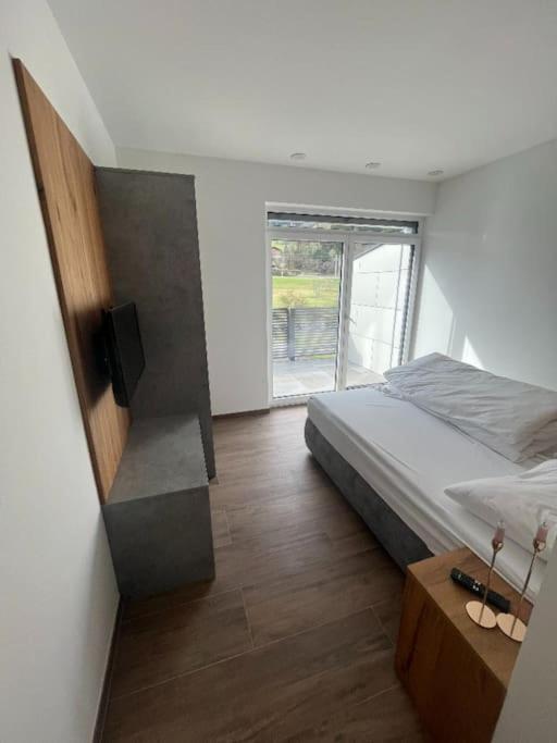 Postel nebo postele na pokoji v ubytování Penthouse Lorenzerhof