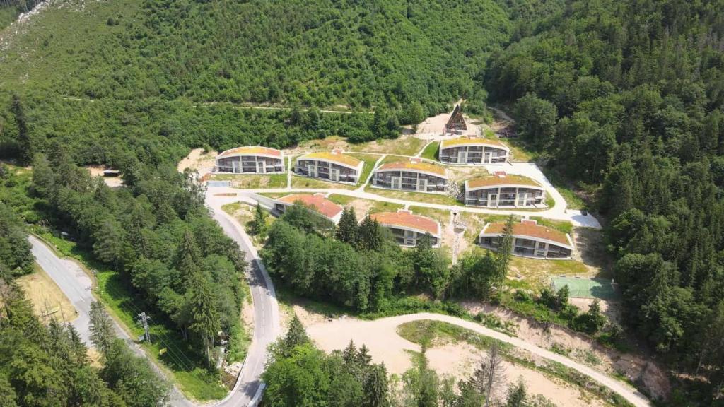 an aerial view of a house on a mountain at Evergreen Tale Apartman F2 in Tale