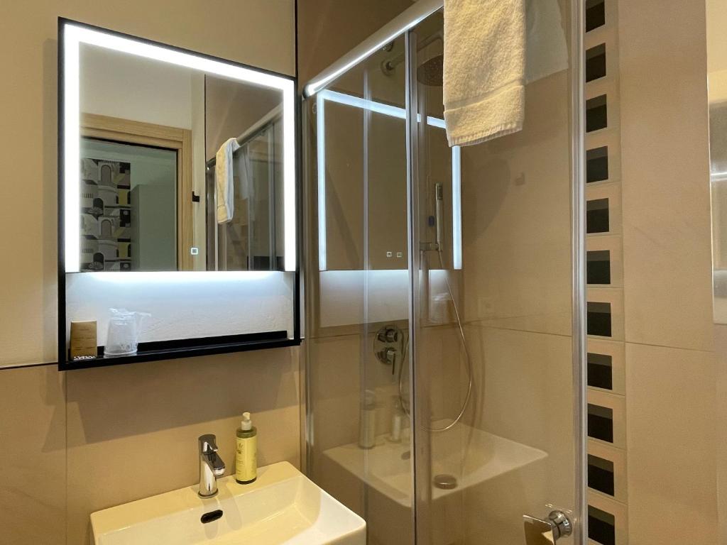 Koupelna v ubytování B City Hotel