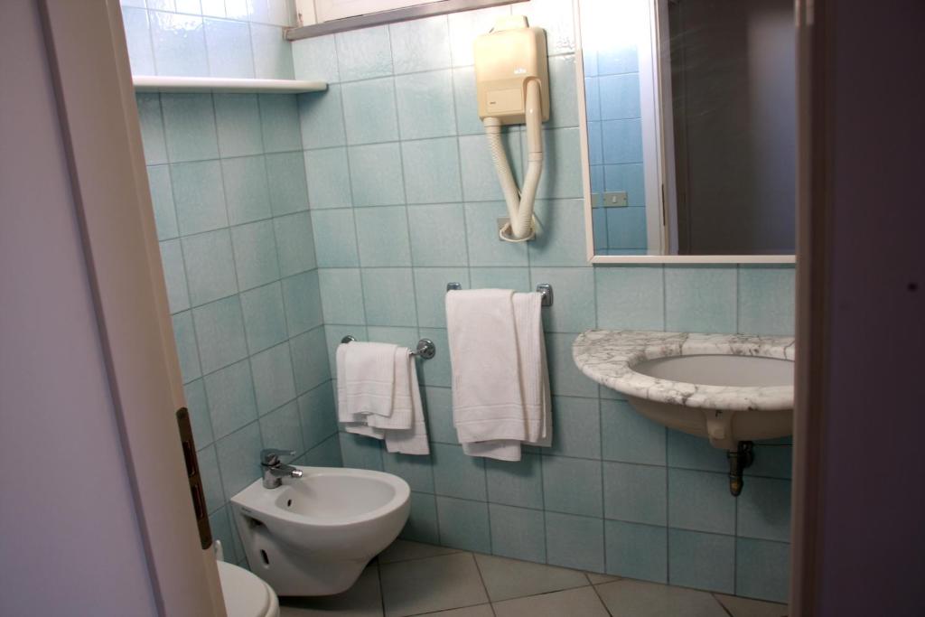 Koupelna v ubytování Hotel Excelsior
