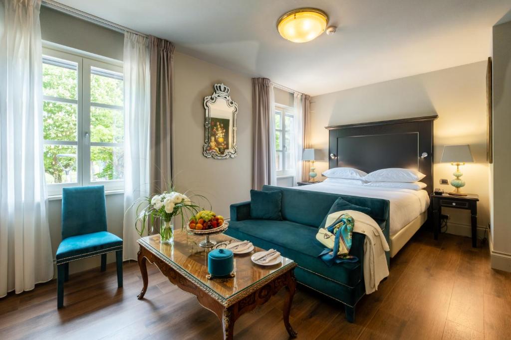 Postel nebo postele na pokoji v ubytování Hotel Vannucci