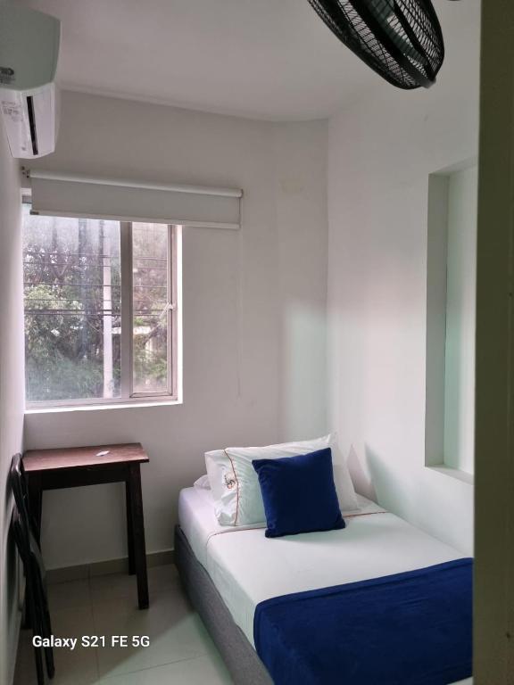 Postel nebo postele na pokoji v ubytování Hotel Casa 10