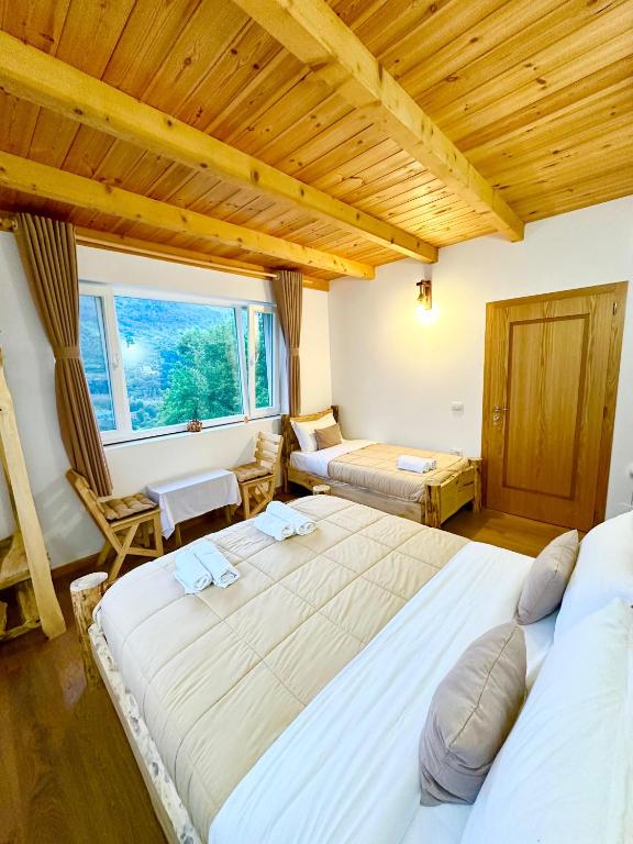 Postel nebo postele na pokoji v ubytování Guesthouse Dritan Tethorja