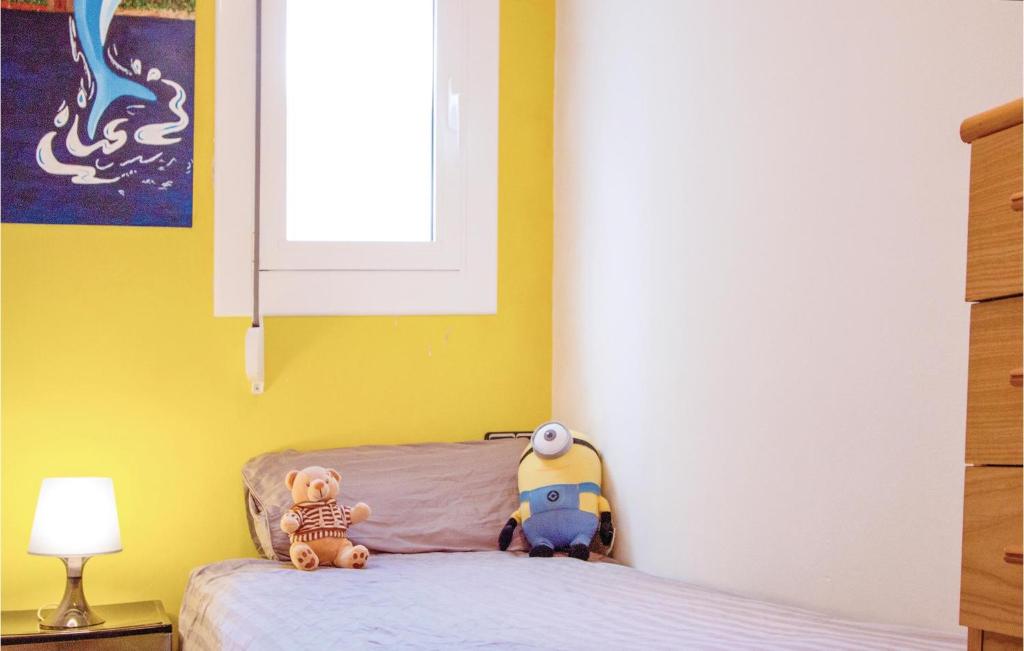 Postel nebo postele na pokoji v ubytování 2 Bedroom Cozy Apartment In Blanes